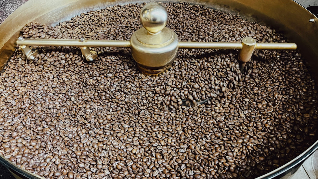 a large pot filled with lots of coffee beans