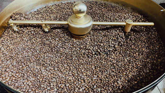 a large pot filled with lots of coffee beans