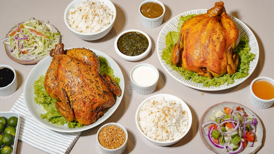A table topped with plates and bowls of food