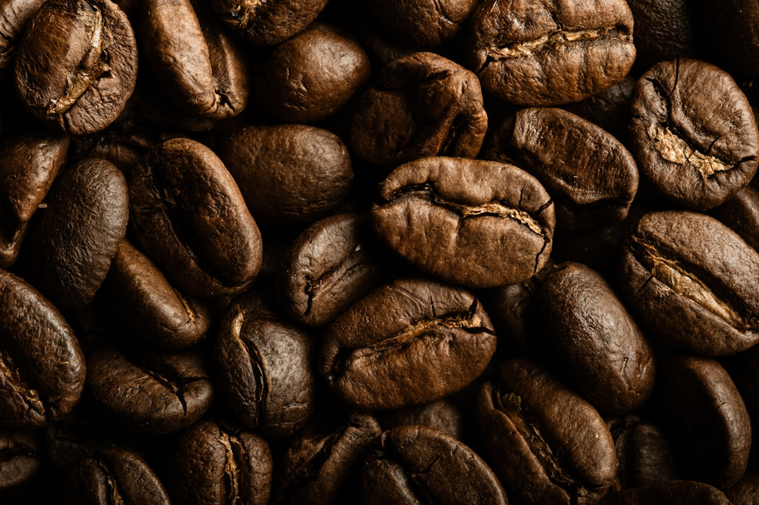 A pile of coffee beans sitting on top of each other