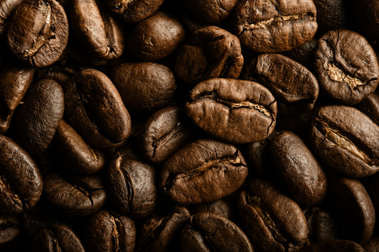 A pile of coffee beans sitting on top of each other
