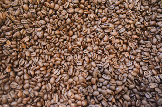 A pile of roasted coffee beans